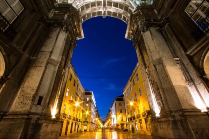 Rua Augusta Arch in Lisbon at night, a must-see sight on a Lisbon tour