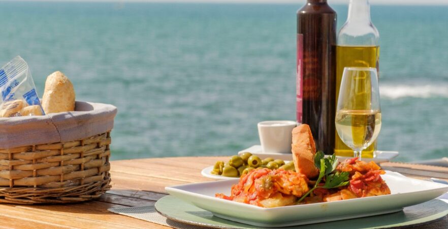 Paella on a table in a beach cafe in Spain